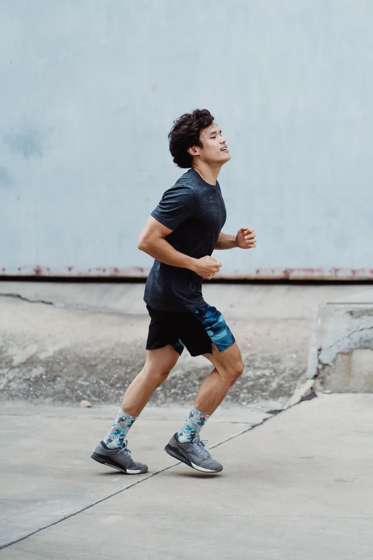 Man running outdoors, representing cardiovascular fitness and healthy blood flow.